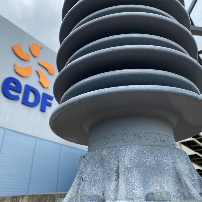 High-voltage insulator on an EDF site treated with HVIC Midsun arc-resistant anti-corrosion coating