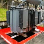 Retention of a Kolektor ETRA electrical transformer in a TRFLEX ECO+ tarpaulin with a double-sided induction process.