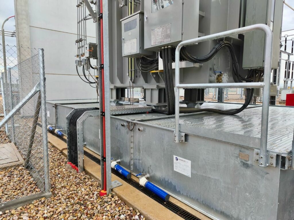 TRT LHD Modulo Solution modulaire de SANERGRID et DISHELEC avec un bac sur mesure équipé de couverture caillebotis LHD et filtration hydrocarbure des eaux de pluie SPI