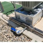 Rainwater filtration using a PETRO-PIT 401® KIT on a bed of gravel at the outlet of a standard ERTF containment basin on a concrete slab